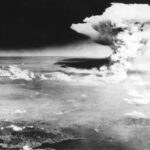 Mushroom cloud of unspeakable destruction rises over Hiroshima following the first wartime dropping of an atomic bomb on August 6, 1945