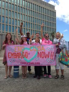 Protest sign: End Cuba Embargo Now