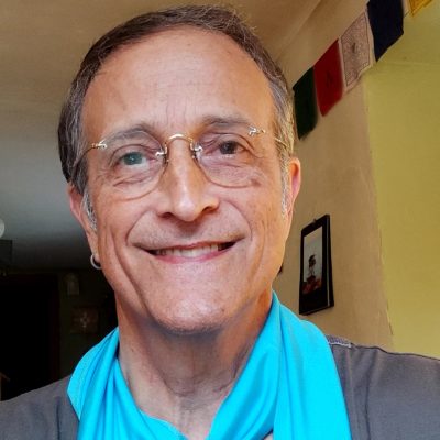 Chapter coordinator Tim Pluta wears a WBW blue peace scarf